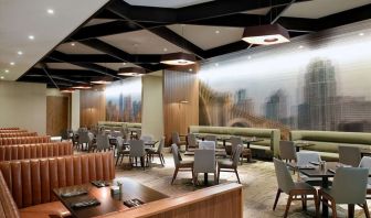 Dining area with comfortable seating at Hilton Minneapolis.