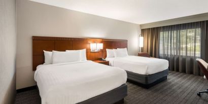 Bright and spacious day use twin room with work desk at Sonesta Select San Jose Airport.