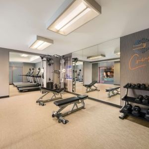 Fully equipped fitness center at Sonesta Select San Jose Airport.