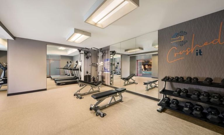 Fully equipped fitness center at Sonesta Select San Jose Airport.