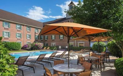 Outdoor pool and lounge area at Sonesta Select Boston Lowell Chelmsford.