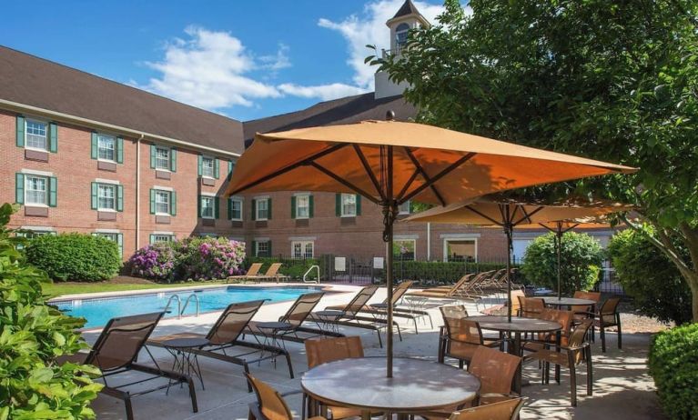 Outdoor pool and lounge area at Sonesta Select Boston Lowell Chelmsford.