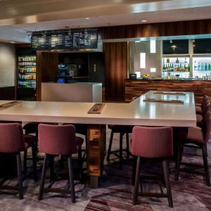 Dining area and workspace, perfect for coworking at Sonesta Select Boston Lowell Chelmsford.