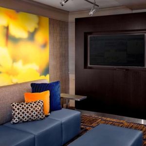 Comfortable lounge seating and workplace at Sonesta Select Boston Danvers's lobby. 