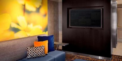 Comfortable lounge seating and workplace at Sonesta Select Boston Danvers's lobby. 
