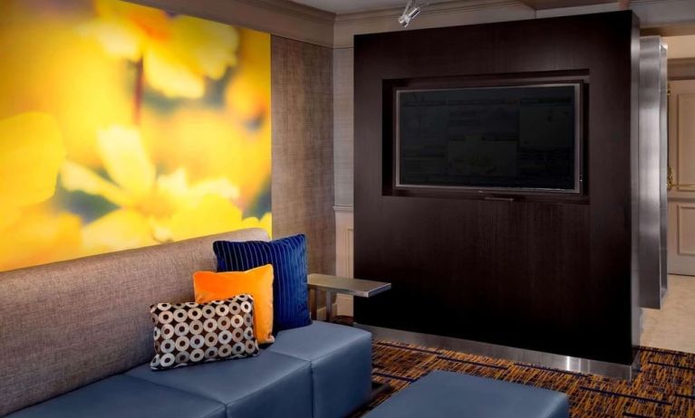 Comfortable lounge seating and workplace at Sonesta Select Boston Danvers's lobby. 