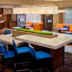 Dining area and workspace at Sonesta Select Boston Danvers.