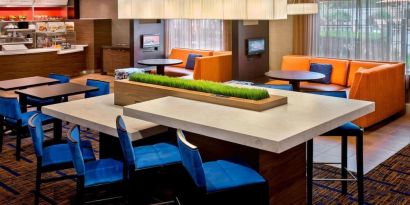 Dining area and workspace at Sonesta Select Boston Danvers.