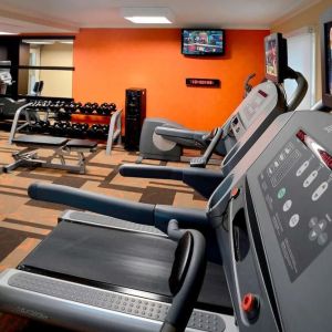 Fully equipped fitness center at Sonesta Select Boston Danvers.
