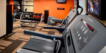 Fully equipped fitness center at Sonesta Select Boston Danvers.