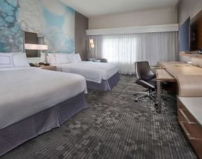 Bright and spacious day use twin room with work desk and private bathroom at Sonesta Select Allentown Bethlehem Airport.