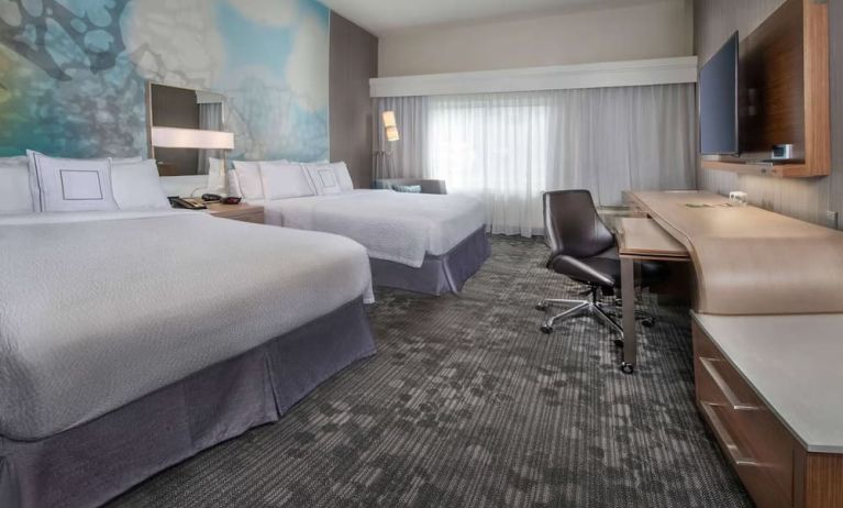 Bright and spacious day use twin room with work desk and private bathroom at Sonesta Select Allentown Bethlehem Airport.