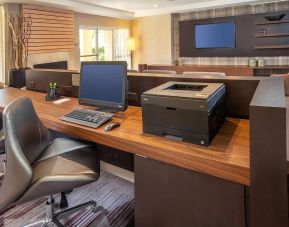 Business center with computer, printer and ergonomic chairs at Sonesta Select Allentown Bethlehem Airport.