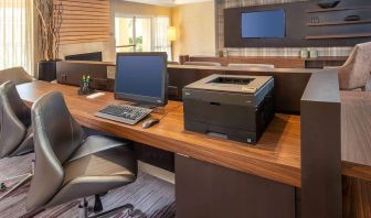 Business center with computer, printer and ergonomic chairs at Sonesta Select Allentown Bethlehem Airport.