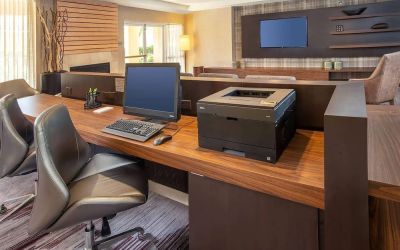 Business center with computer, printer and ergonomic chairs at Sonesta Select Allentown Bethlehem Airport.