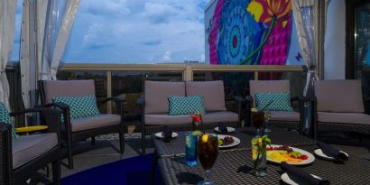 Furniture in rooftop perfect for coworking at Beacon Hotel.