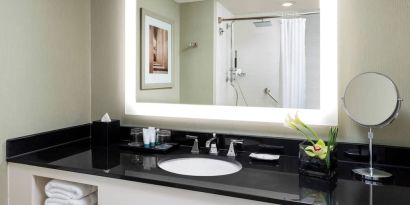 Guest bathroom with shower at The Westin Arlington Gateway.