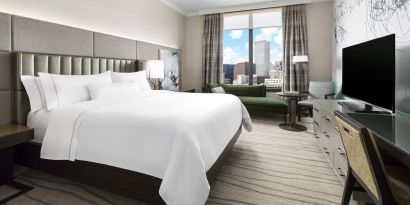 Delux king room with TV and a great view of the city at The Westin New Orleans.