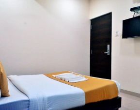 King room with TV and AC at THE BEST HOTEL MUMBAI.