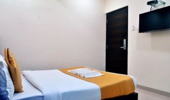 King room with TV and AC at THE BEST HOTEL MUMBAI.
