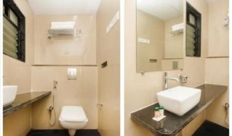 Guest bathroom with shower at THE BEST HOTEL MUMBAI.