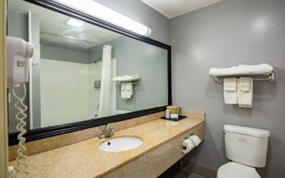 Guest bathroom at Quality Inn & Suites Woodstock Near Lake Geneva.