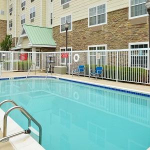 Outdoor seasonal pool at Towneplace Suites By Marriott Arundel Mills.