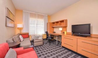 Lounge area and TV at Towneplace Suites By Marriott Arundel Mills.