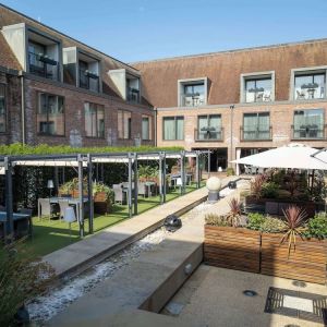 Hotel terrace and garden at Hilton London Syon Park.