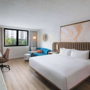 Bright and spacious day use room with work des at Sonesta Miami Airport.