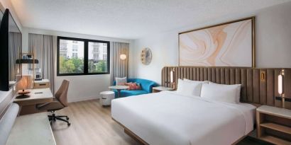 Bright and spacious day use room with work des at Sonesta Miami Airport.