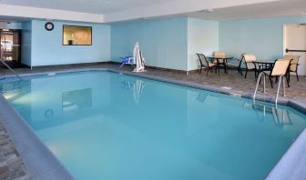 Indoor heated pool with lounge chairs at Hampton Inn Columbus-East.