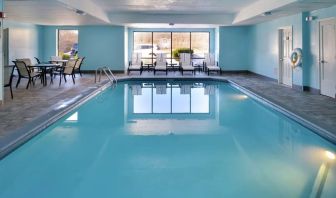 Relaxing indoor pool with lounge seating at Hampton Inn Columbus-East.