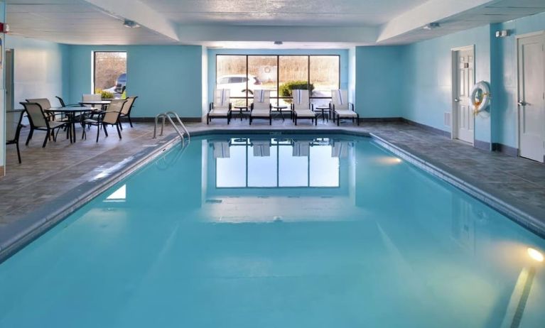 Relaxing indoor pool with lounge seating at Hampton Inn Columbus-East.