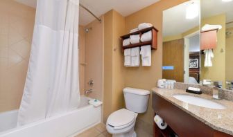Private guest bathroom with combined shower and tub at Hampton Inn Columbus-East.