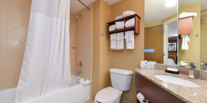 Private guest bathroom with combined shower and tub at Hampton Inn Columbus-East.
