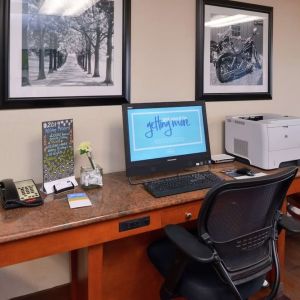 Business center with computer, printer and ergonomic chair at Hampton Inn Columbus-East.