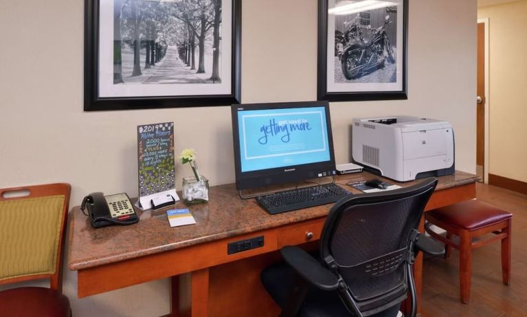 Business center with computer, printer and ergonomic chair at Hampton Inn Columbus-East.