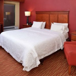 Day use room with work desk and sofa at Hampton Inn Columbus-East.