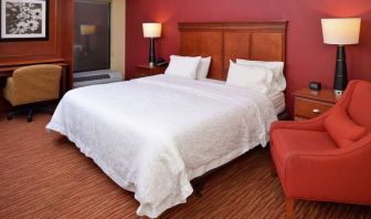 Day use room with work desk and sofa at Hampton Inn Columbus-East.