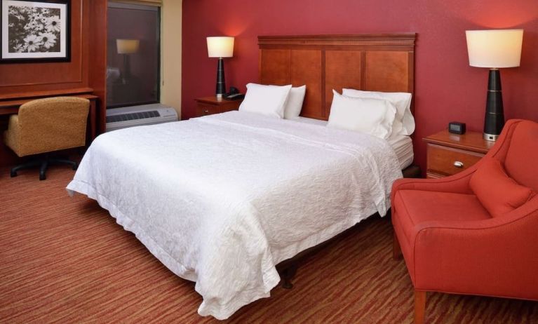 Day use room with work desk and sofa at Hampton Inn Columbus-East.