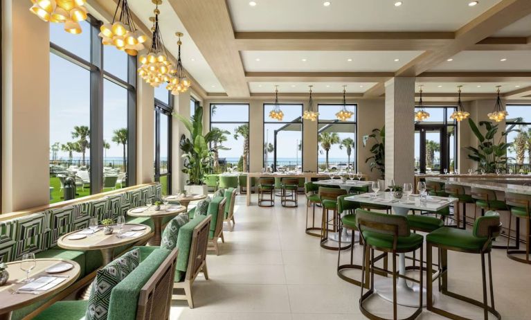 Stylish on-site restaurant at Embassy Suites By Hilton Panama City Beach Resort.