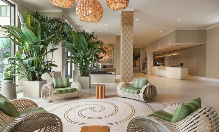 Beautiful lobby lounge at Embassy Suites By Hilton Panama City Beach Resort.