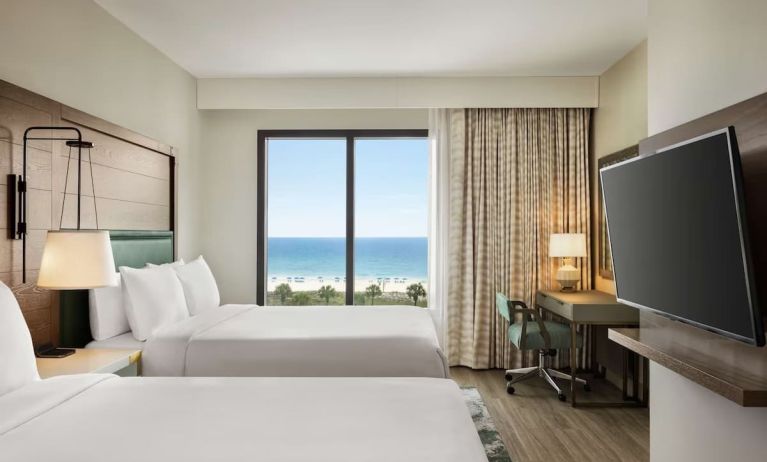 Day use twin room with sea view, work desk and private bathroom at Embassy Suites By Hilton Panama City Beach Resort.