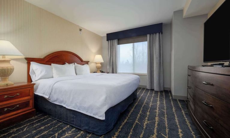 Standard day use room with TV screen and private bathroom at Hilton Garden Inn Milwaukee Northwest Conference Center.