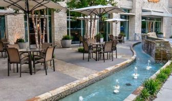 Alfresco dining perfect for coworking at Hilton Dallas/ Plano Granite Park.