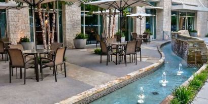 Alfresco dining perfect for coworking at Hilton Dallas/ Plano Granite Park.