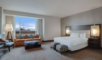 Spacious meeting room with living area at Hilton Dallas/ Plano Granite Park.

