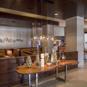 Lobby and coworking lounge at Hilton Dallas/ Plano Granite Park.