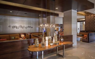 Lobby and coworking lounge at Hilton Dallas/ Plano Granite Park.